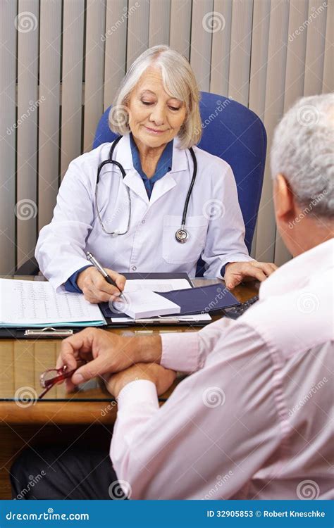 Doctor In Office Giving Consultation Stock Image Image Of