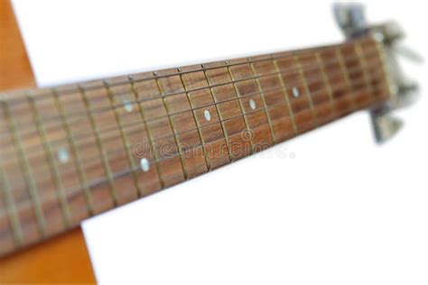 Neck Of Acoustic Guitar Isolated On White Background Selective Focus