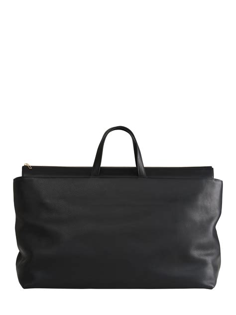 KHAMSIN weekender in black calfskin leather | TSATSAS