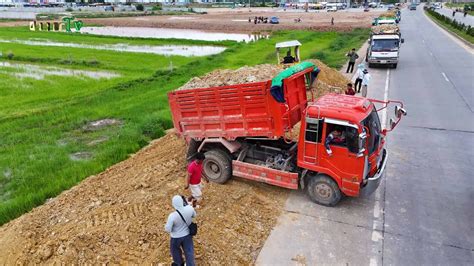 Technique Filling Land Next To The Road Use Dump Trucks T Land