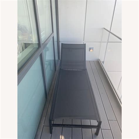 CB2 Black Outdoor Lounge Chair - AptDeco