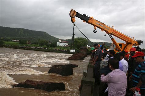 India Bridge Collapse 14 Bodies Found After Buses Cars Plunge Into