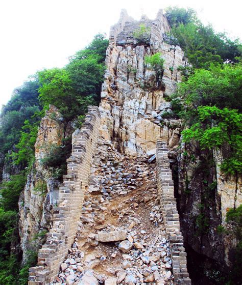 Wild Part Of The Great Wall Of China Damaged By Nature Thieves And