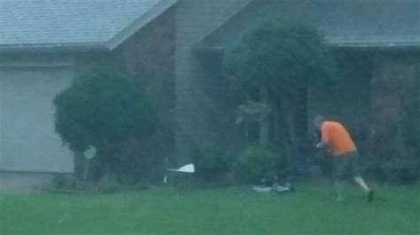 Man Mows Lawn During Storm Youtube