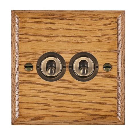 Hamilton Woods Ovolo Medium Oak 2 Gang 20ax 2 Way Toggle Switch With Antique Brass Toggles Ukes