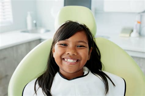 Why Are My Child’s New Adult Teeth Yellow? Causes and Solutions