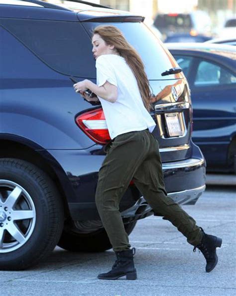 Miley Cyrus Showing Her Sexy Ass And Hard Nipples In See Thru Shirt Porn Pictures XXX Photos