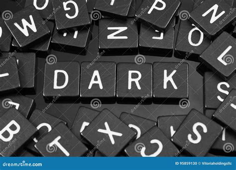 Black Letter Tiles Spelling The Word X22 Dark X22 Stock Photo