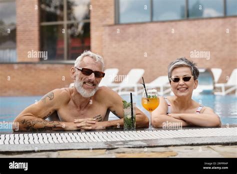 Mature Couple In Swimming Pool Hi Res Stock Photography And Images Alamy