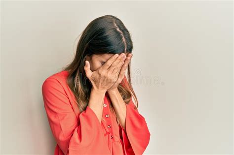 Young Beautiful Woman Wearing Casual Clothes With Sad Expression