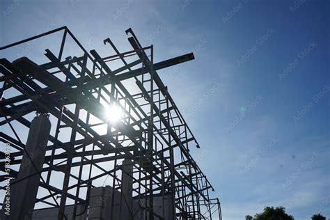 steel roof truss construction of the residence Stock Photo | Adobe Stock