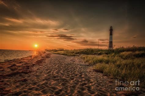 Warm Sunrise at the Fire Island Lighthouse Photograph by Alissa Beth ...