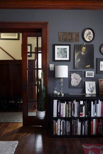 Natural Wood Trim Is Complemented By Desaturated Navy Walls Benjamin