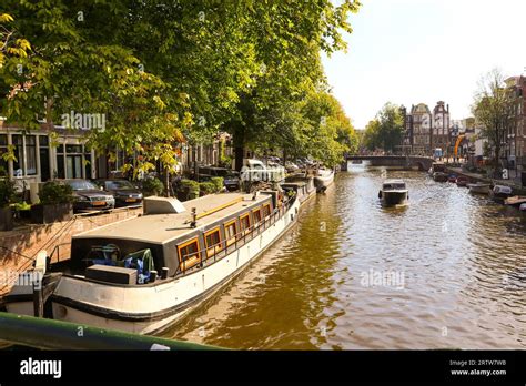 Amsterdam Canal Boat Stock Photo - Alamy