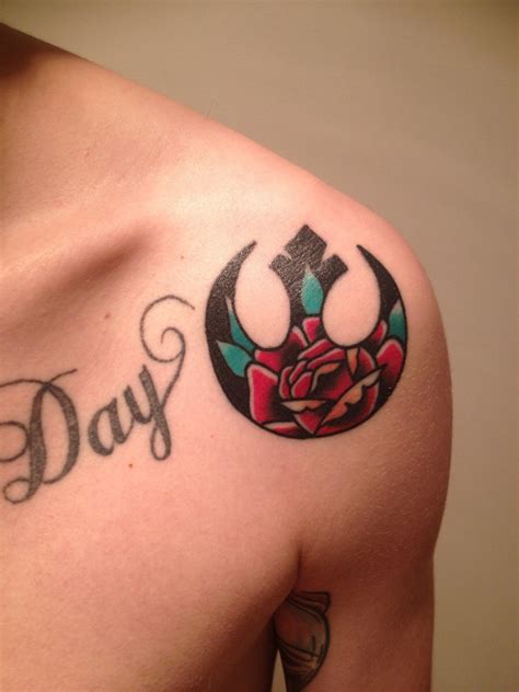 Healed Shot Of My Rebel Alliance Tattoo With A Traditional Rose Filler Done By Mitch Love