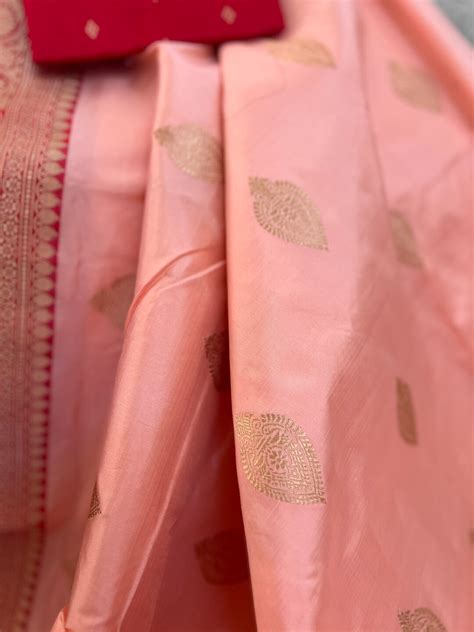 Banarasi Katan Silk Saree In Peachish Pink And Red Border With Gold