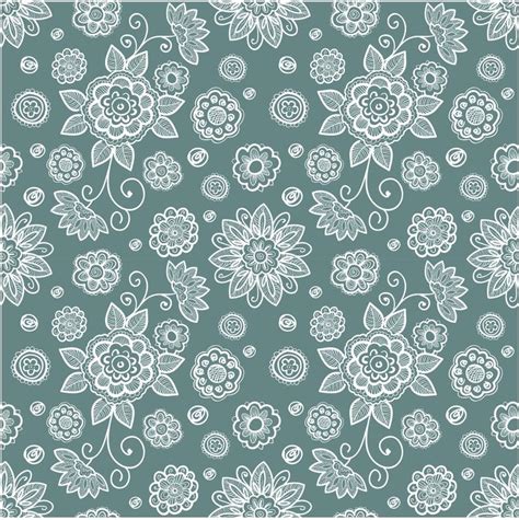 A Blue And White Floral Pattern On A Green Background