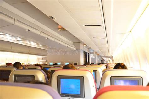 Aircraft Cabin Interior with Passengers Stock Image - Image of board ...