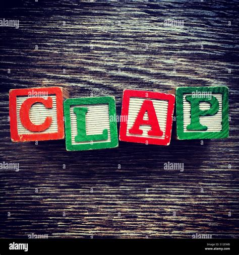 CLAP word written with wood block letter toys Stock Photo - Alamy