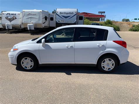 Certified Pre Owned 2012 Nissan Versa S Hatchback In Knight Nissan P3235a Knight Automotive Group