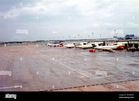 A View Of Heathrow Airport London During The 1970s Showing A Line Of