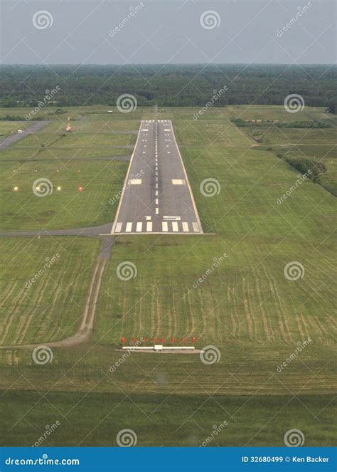 View Of The Runway End Of The Airport, And A Take-off Plane Against The