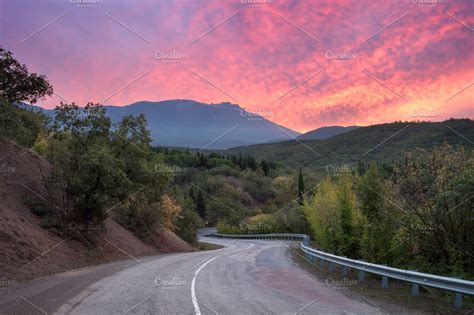 Mountain winding road at sunset | High-Quality Transportation Stock ...