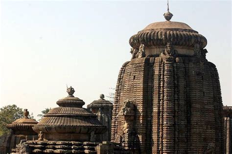 an old stone structure with statues on it