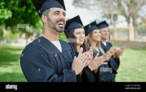 Group of people students graduated clapping applause at university ...