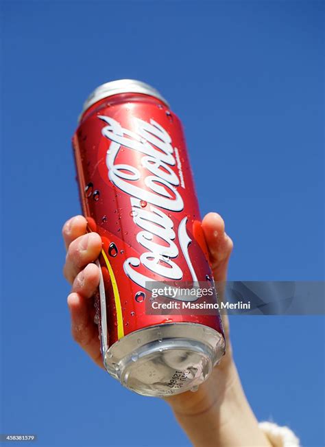 Human Hand Holding Cocacola Can High Res Stock Photo Getty Images