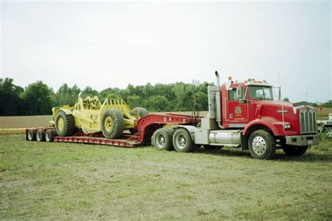 Kenworth T800 Lowboy Hauling A Euclid S 7 Scraperthis Might Belong To