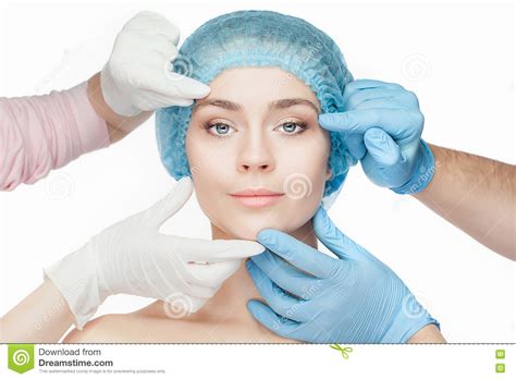 Plastic Surgery Concept Doctor Hands In Gloves Touching Woman Face