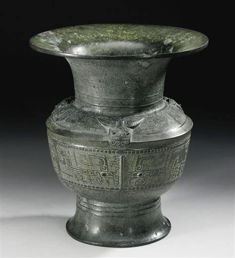 A Large Archaic Bronze Ritual Wine Vessel Zun Late Shang Early