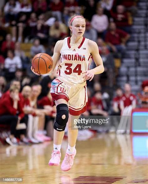 Grace Berger of the Indiana Hoosiers dribbles the ball against the ...