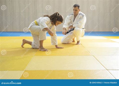 Judo Master and Young Yellow Belt Judo Girl are Training Stock Photo ...