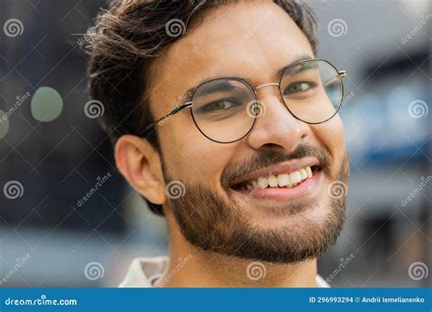 Happy Indian Man Smiling Looking Away Dreaming Resting Good News