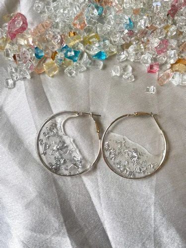 Handcrafted Earning Milled Round Shape Silver Color Resin Earing At Rs