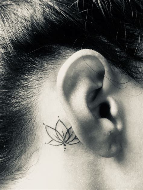 Simple Lotus Flower Tattoo Behind Ear