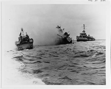 Auk-class minesweeper USS Tide (AM-125) sinking off Utah Beach after ...