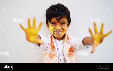 Happy Cute Smiling Little Indian Kids Showing Their Colourful Hands Or