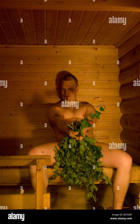 A Crazy Naked Finn In Sauna Covering Private Parts With A Traditional