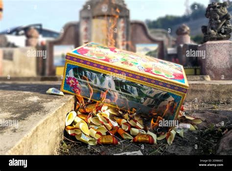 Burn Offering Paper Money And Gold To Ancestors During Qingming Stock