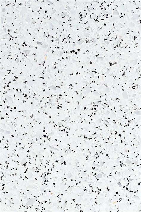 White granite textured tile with black stains | premium image by ...