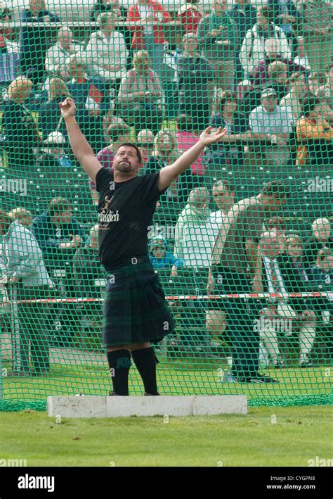 Man Having Thrown A Hammer In The Hammer Throwing Competition At