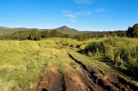 Premium Photo High Altitude Moorland Against A Scenic Mountain