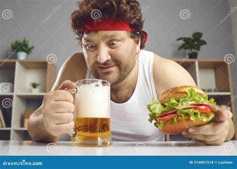 Excited Crazy Fat Man Drinking Beer And Eating Burger Headshot Portrait