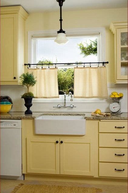 Soft Butter Yellow Cabinets With White Walls And Subway Tile Cute Half