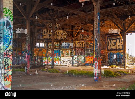 Abandoned Warehouse Building Covered in Graffiti Art Stock Photo - Alamy