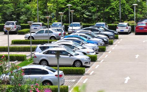 Cars in parking lot stock photo. Image of park, direct - 20853590