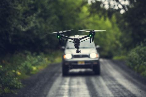 Free Stock Photo Of A Drone Flying Flying Over The Road Download Free